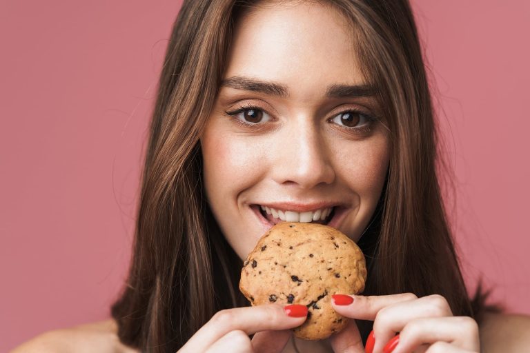 woman eating a biscuit